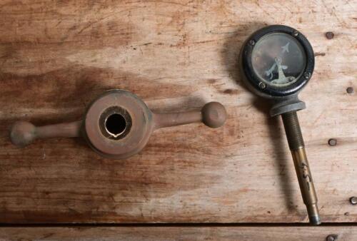 MASCOT: An early temperature gauge with brass dog bone base, for radiator mounting