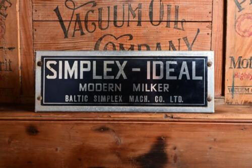 SIMPLEX-IDEAL: A galvanised tin 'Simplex-Ideal Modern Milker' sign, with mounting brackets, 15.5cm high, 44.5cm wide
