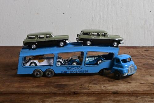 LESNEY: A circa 1950s Lesney Matchbox Car Transporter with four modern vehicles