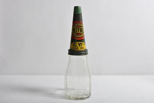 CASTROL: A circa 1940/50s "Castrol Wakefield" embossed one imperial pint oil bottle, with circa 1900/1910 "Castrol Wakefield CW SAE 30" tin pourer and dust cover