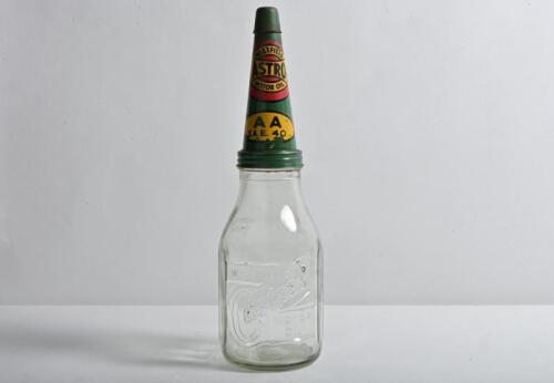 CASTROL: A circa 1940/50s "Castrol Wakefield" embossed one imperial quart oil bottle, with 1900/10s "Castrol Wakefield" AA SAE 40 tin pourer and lid