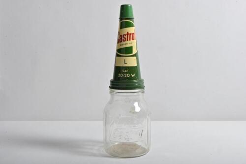 CASTROL: A circa 1990s "Castrol " pint bottle, with "Castrol Motor Oil L L SAE 20-20 W" tin pourer and dust cover, this rarer bottle has no vertical embossed extension line under the wording Castrol