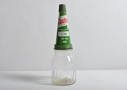 CASTROL: A circa 1960s "Castrol" embossed pint oil bottle, with circa 1960s "Castrol Motor Oil CW 30-40 MS" tin pourer and dust cover