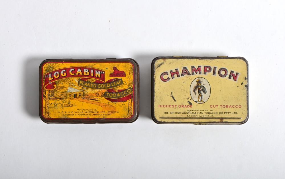 TOBACCO TINS: Two vintage 2 oz tobacco tins, Log Cabin Flaked Gold Leaf  Tobacco and Champion Highest Grade Cut Tobacco