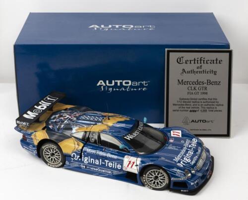 MERCEDES-BENZ: A NOS BIG 1:12 scale Autoart Signature Mercedes-Benz CLK GTR FIA GT 1998 Maylander/Bouchut "Original-Teile" #11 die-cast model with opening doors, and detachable parts as separate fitment and Certificate of Authenticity # 0040/5000