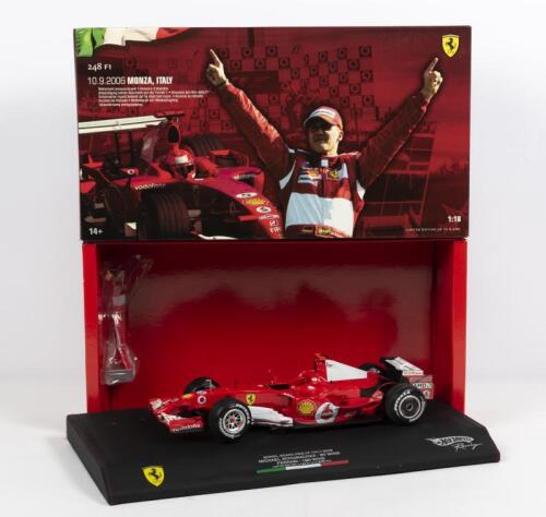 FERRARI: A NOS 1:18 scale Hot Wheels Formula 1 2006 Ferrari 248 F1 #5 Michael Schumacher Monza Grand Prix of Italy Retirement Announcement die-cast model with Figurine numbered Limited Edition