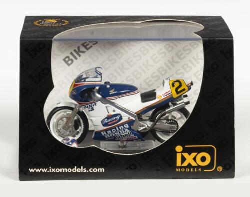 HONDA: A NOS 1:24 scale IXO Models Honda NSR500 #2 Wayne Gardner 1987 Champion die-cast model