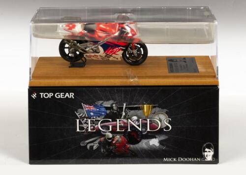 HONDA: A NOS 1:24 scale Top Gear Honda NSR 500 Mick Doohan 1994 -1998 World Champion die-cast model