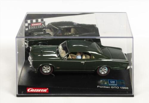 CARRERA: A NOS 1:32 scale Carrera Pontiac 1966 GTO Slot Car with additional pick-up braids & Guide Keels
