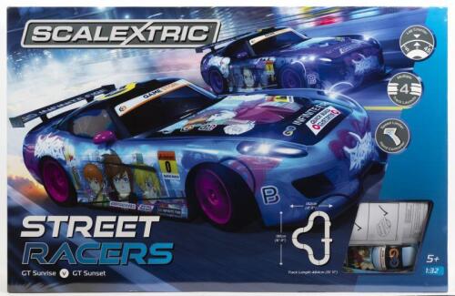 SCALEXTRIC SET: A NOS sealed Scalextric "Street Racers" car slot set with 2 cars, circuit of track & Transformer