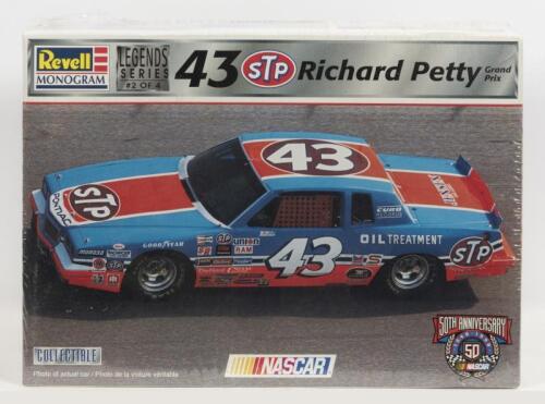 REVELL: A NOS 1:24 scale Revell Pontiac Grand Prix Richard Petty "STP" Sealed Model Kit