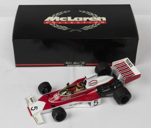 McLAREN: A NOS 1:18 scale Minichamps Formula 1 McLaren Ford M23 E. Fitipaldi #5 "Texaco" 1974 die-cast model