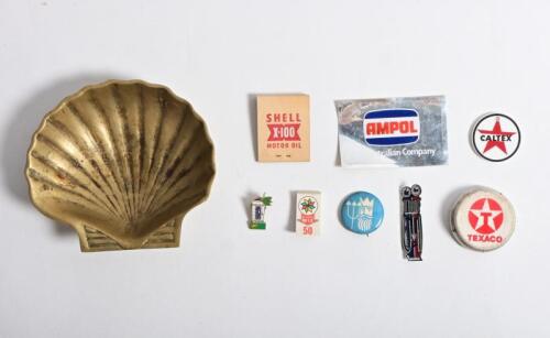 PROMOTIONAL MATERIAL: A collection of various oil and petrol related items including badges, matches and a later Shell form ashtray