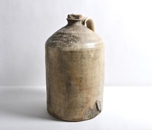 DEMIJOHN: A rare late 19th century Australian Cuming Smith & Co Sickle Brand three gallon salt glazed ceramic stoneware demijohn, with impressed mark for Bendigo Pottery to the neck, 44cm high