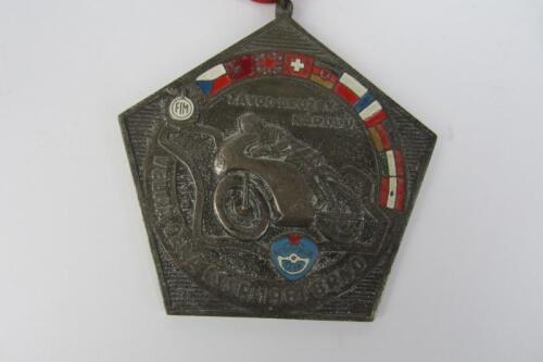 GRAND PRIX OF CZECHOSLOVAK SOCIALIST REPUBLIC: A large metal medallion from the 1961 Race of Nations held in Brno, Czechoslovakia.