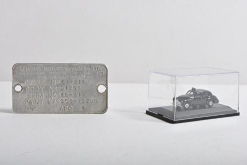 HOLDEN: Two 48 215 items, comprising a body plate and a cased scale model by Oxford, the plate 5.5 x 10cm