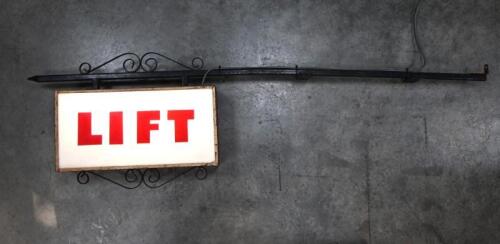 LIFT: An original double sided wall mounted illuminated sign, 31 x 62cm overall, length of hanging pole 189cm
