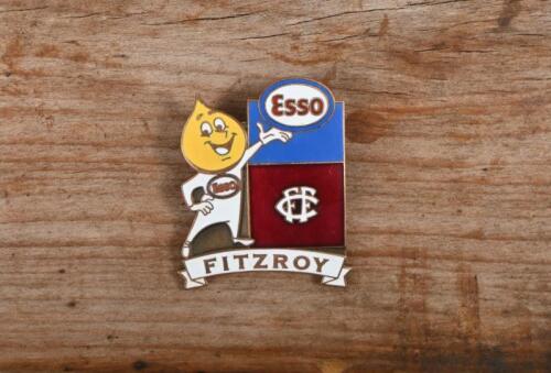 AFL/LIONS: A Lions enamel badge by Bertram together with a VFL Ampol 'The Lions' unused sticker