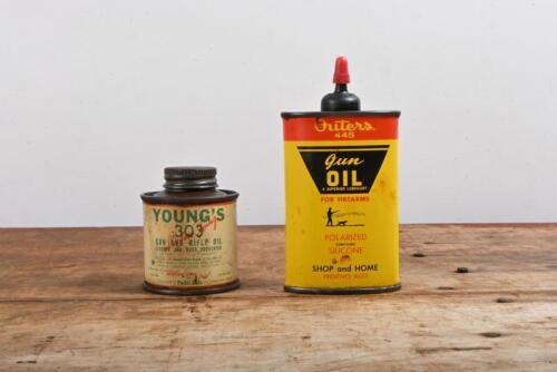 GUN OIL: Two three fluid ounce gun oil tins, including Outers