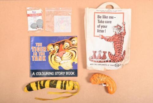 ESSO: A original 1960s Esso complementary&nbsp;dealers bag with Tiger Tail, Esso 'The Tiger In The Tank' Colouring book, Tiger water pistol, unapplied Esso tiger transfer sticker and a sealed set of plastic 'decimal coins'