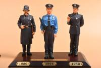 POLICE FIGURINE SETS: Two Liberty Classics figurine sets comprising of 'New York Police Department' and 'California Highway Patrol' themed sets - 3
