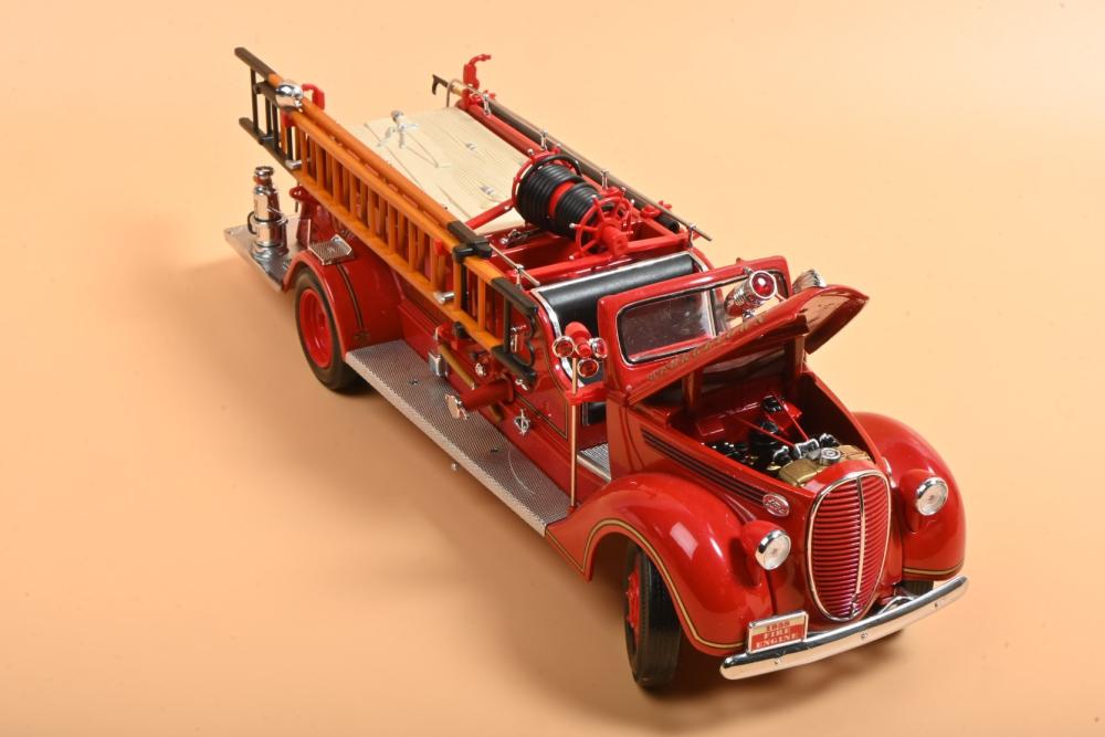 FORD: A Road Signature Series hand assembled 1:24 scale 1938 Ford Fire  Engine. 'GEORGETOWN' livery. CoA - Price Estimate: $ - $