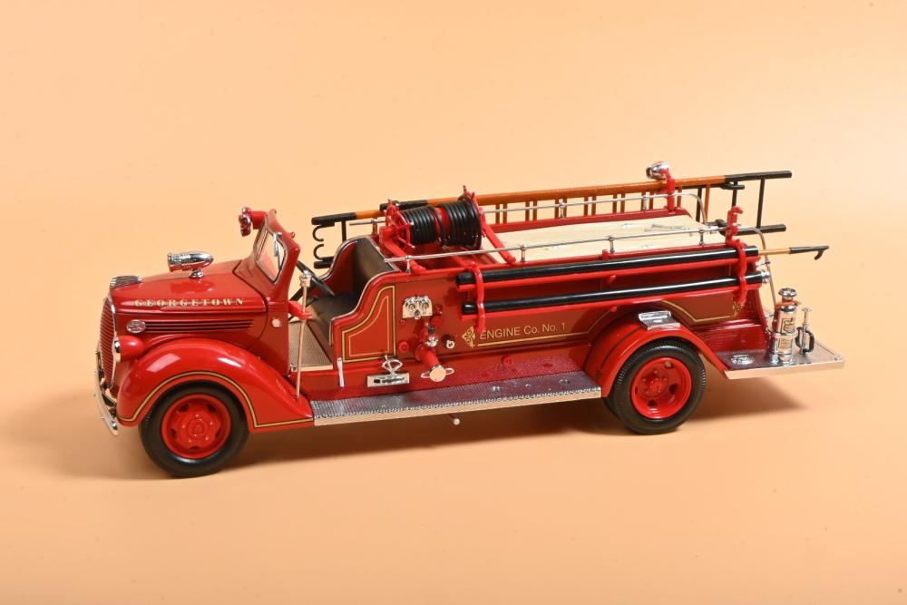 FORD: A Road Signature Series hand assembled 1:24 scale 1938 Ford Fire  Engine. 'GEORGETOWN' livery. CoA - Price Estimate: $ - $