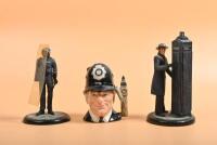 LONDON POLICE: Three English Police figurines. Paul Slade Riot Police figurine & ROYAL DOULTON 'THE LONDON "BOBBY"' Toby Jug