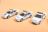 AUSTRALIAN POLICE CARS: A collection of 1:43 scale Australian Police cars by PARADISE GARAGE based on the VR Holden Commodore. N.S.W, VIC, W.A Police cars - 3