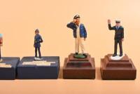 VICTORIA POLICE: A collection of Victoria Police metal figurines. 'MOUNTED TROOPER MELBOURNE POLICE 1851' and POLICE Air Wing figurines - 4