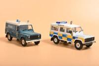 LAND ROVER: Four Land Rover Defender 1:43 scale models by Corgi. 'POLICE' liveries - 3