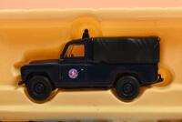 LAND ROVER: Two 1:43 scale Lledo Vanguards Land Rover models. Boxed Limited Edition Land Rover LWB Series 2 in Kent Constabulary livery (VA07601) & Series 1 Army Police Land Rover - 2