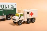 EMERGENCY VEHICLES: Three emergency vehicle models. First Gear GMC Truck in 'POLICE EMERGENCY SERVICE DISTRICT' - 2