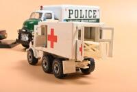 EMERGENCY VEHICLES: Three emergency vehicle models. First Gear GMC Truck in 'POLICE EMERGENCY SERVICE DISTRICT' - 3