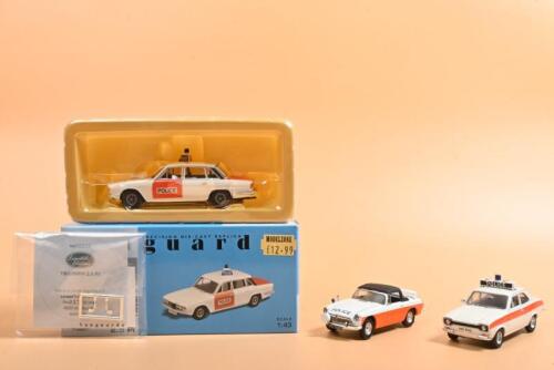 ENGLISH POLICE CARS: A collection of English Police cars. TRIUMPH 2.5 PI in West Mercia Constabulary livery (VA08201) & Ford Escort Mk I in POLICE livery