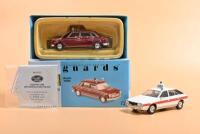 POLICE: Two 1:43 scale Lledo Vanguards models. Austin 1800 in colours of 'DIPLOMATIC PROTECTION GROUP' (VA08902) & Princess Police Car