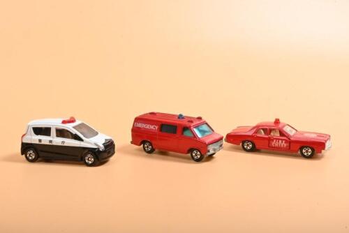 TOMICA: Three Tomica fire and police models. 1976 DODGE CORONET CUSTOM in red 'FIRE CHIEF' livery (NO.F 8.9.10.18) & 1977 CHEVROLET CHEVY VAN IN red 'EMERGENCY' livery (NO.F22)