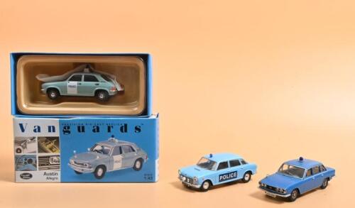 ENGLISH POLICE CARS: Three 1:43 scale English Police cars by Lledo Vanguards. Limited Edition Austin Allegro in 'METROPOLITAN POLICE' livery (VA45001). Numbered '0735' of 6400 produced. With Wolseley and Triumph Police cars