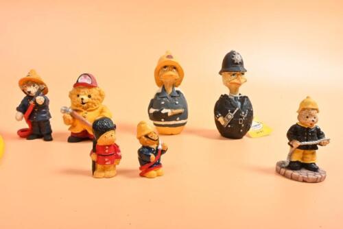 FIRE/POLICE FIGURINES: A group of Fire and Police related figurines. EGGBERT figures by Malcolm Bowmer