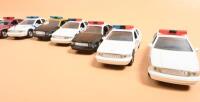 CHEVROLET CAPRICE: A collection of ten 1:43 scale ROAD CHAMPS Chevrolet Caprice Police cars. Each in different American State Police/Patrol/Trooper livery. Circa 1990's - 3