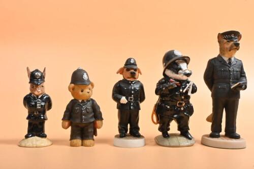 POLICE ANIMALS: A group of porcelain and resin Police animals figurines. "P.C. Borage Bager" (R38382) from tales of Honeysuckle Hill as produced by Regency Fine Arts & Royal Doulton POLICEMAN BUNNYKINS DB 64