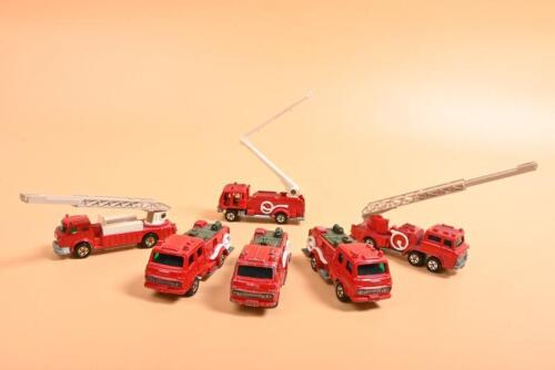TOMICA FIRE ENGINES: A group of tomica Fire Engines. Three examples of No.22/NO.94 UD CONDOR CHEMICAL FIRE ENGINE