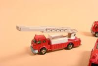 TOMICA FIRE ENGINES: A group of tomica Fire Engines. Three examples of No.22/NO.94 UD CONDOR CHEMICAL FIRE ENGINE - 3