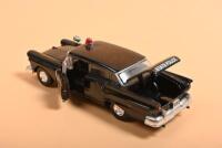 AMERICAN POLICE CARS: Four 1:43 American Police cars by various model manufacturers. 1950's Ford & Corvair models - 2