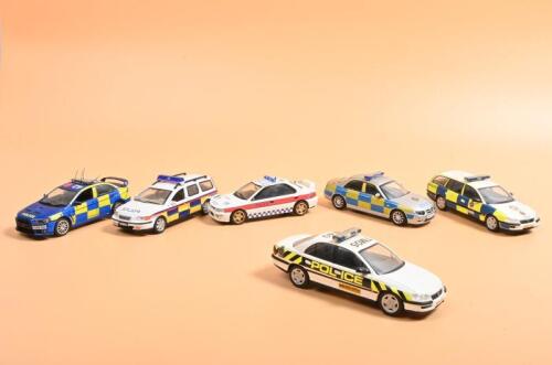 ENGLISH POLICE: A collection of modern English Police vehicles by various model manufacturers. HONGWELL 2000 Volvo V70, Schuco Opel Omega, Trofeu Subaru Impreza, Vanguards ROVER 75/MG-ZT models