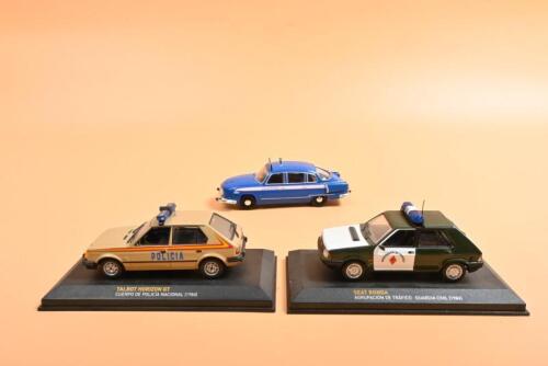 INTERNATIONAL POLICE CARS: Three 1:43 scale International Police cars. TALBOT HORIZON GT in 'CUERPO DE POLIC&Iacute;A NACIONAL' (1984) livery & SEAT RONDA in 'AGRUPACION DE TRAFICO - GUARDIA CIVIL' (1984) livery