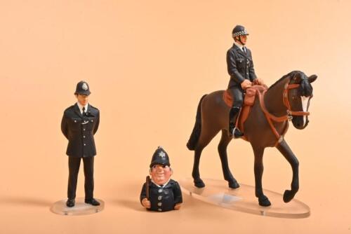 POLICE: Three metal English Policeman metal figurines. CORGI 'POLICEMAN' on horseback & standing 'POLICEMAN'