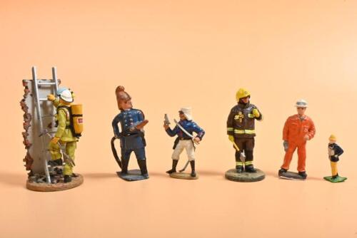 METAL FIGURINES: A selection of different metal figurines of various scales. del Prado Hobart Fire Fighter & London Fireman