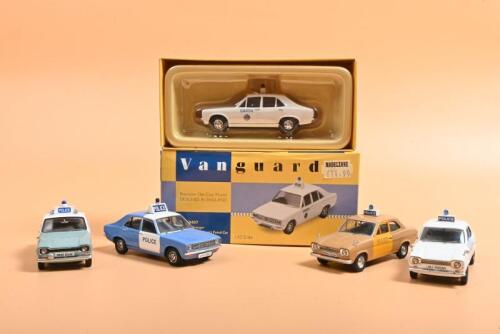 FORD/HILLMAN: A collection of five Ford and Hillman Lledo Vanguards English and Irish Police cars. Limited Edition Hillman Avenger Garda, Mallow District Patrol Car (VA10407) numbered '0328' of 1750. Ford Escort Mk I models
