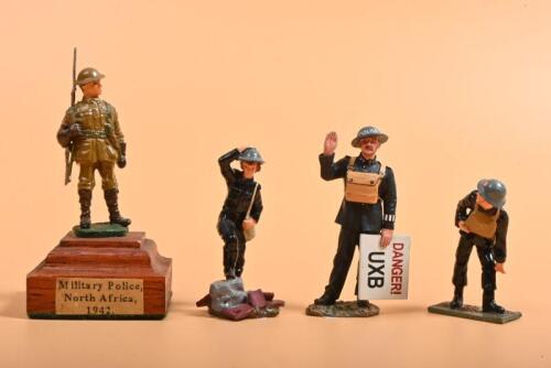WWII: Four all metal WWII figures. Three British Military Police figures & North Africa 1942 Military Police figure